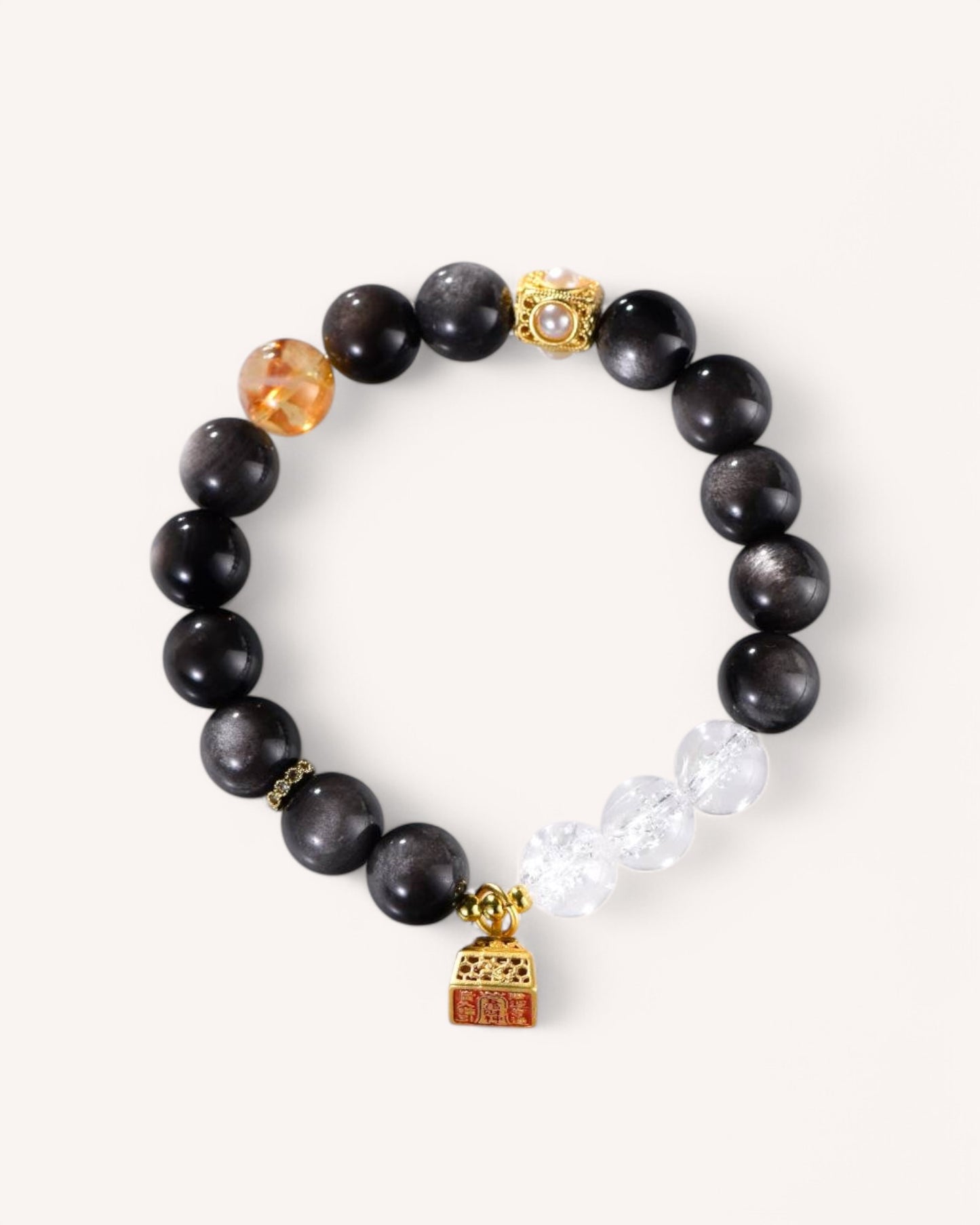 Main image of Silver Sheen Obsidian and White Quartz bracelet with gold charm for financial success and protection
