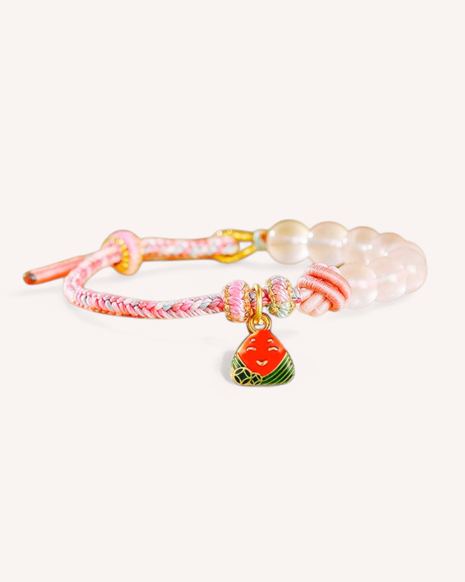 Side view of the Rose Quartz Woven Bracelet, showing the intricate woven cord and white quartz beads, symbolizing mental clarity and resilience.