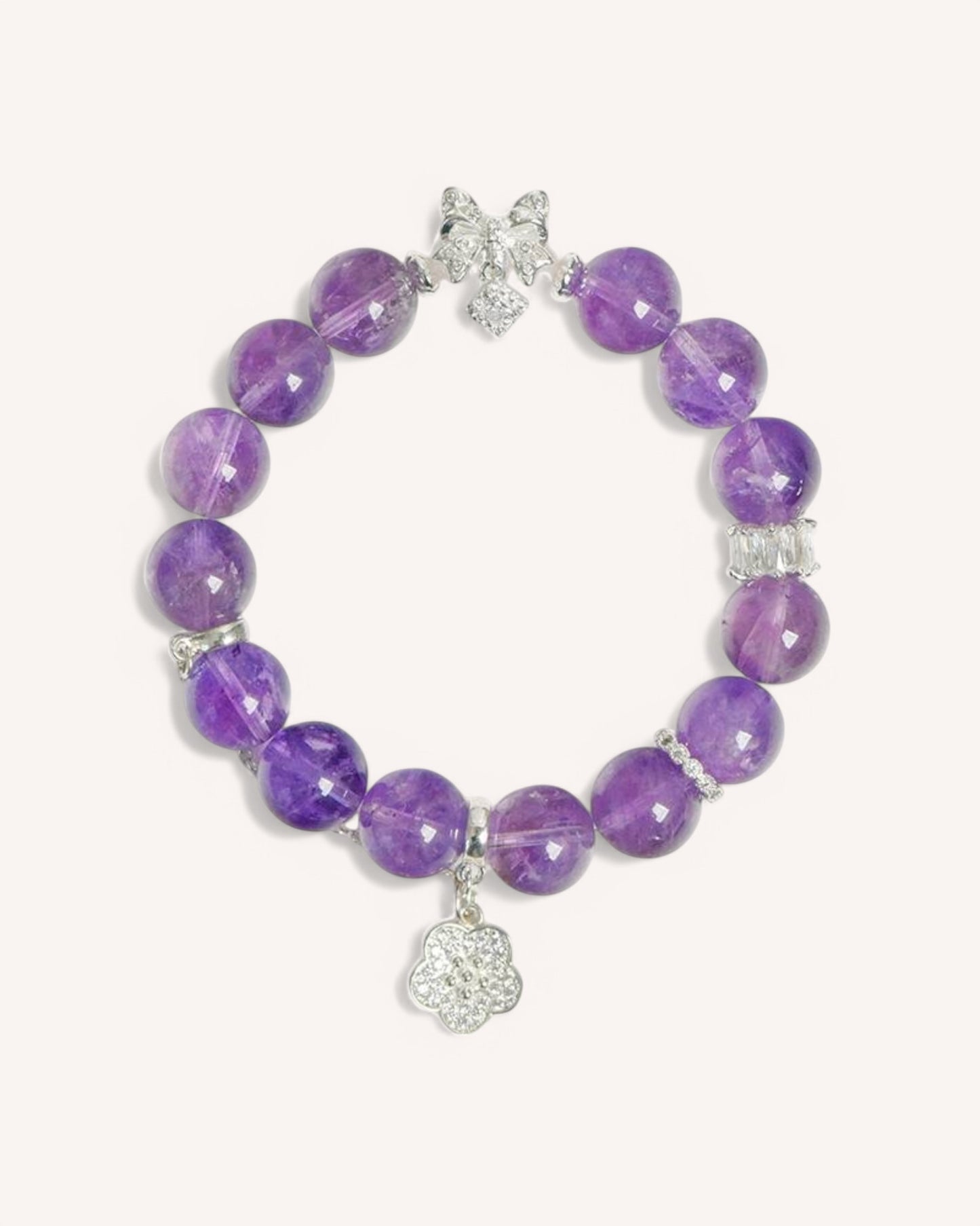 Elegant amethyst bracelet featuring a silver lotus charm, designed to enhance spiritual protection, inner peace, and emotional clarity. Perfect for meditation and daily energy balance.