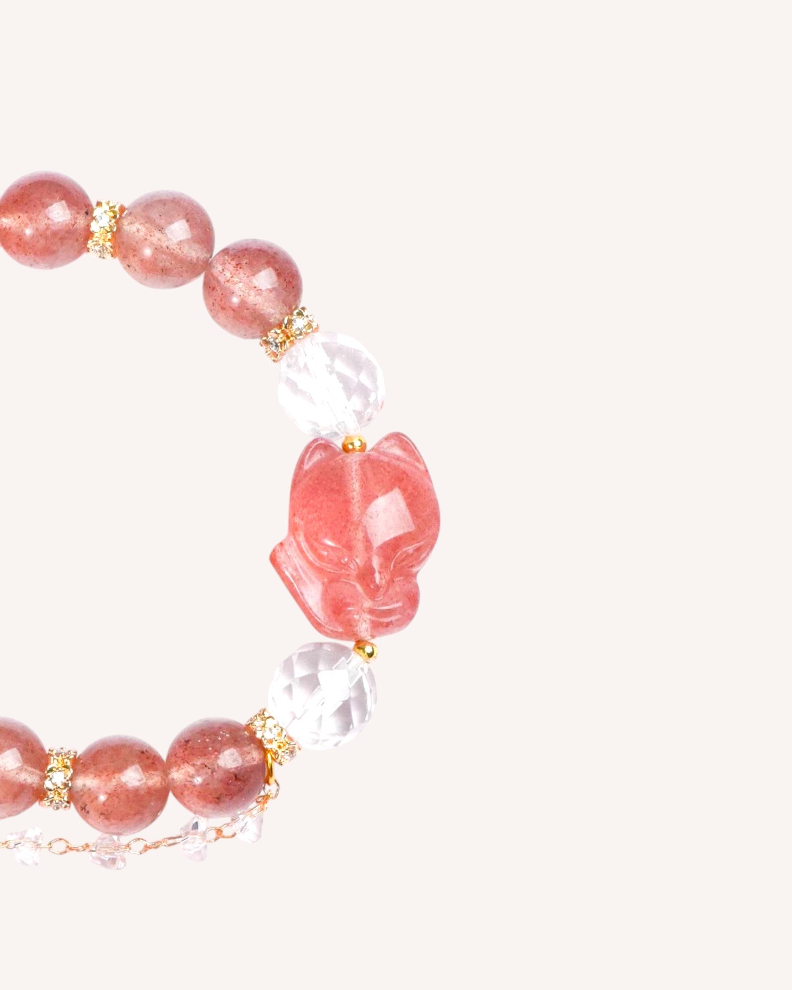 Close-up of Strawberry Quartz Bracelet with Fox Charm – Healing crystal design for attracting love, boosting charm and balancing emotions.