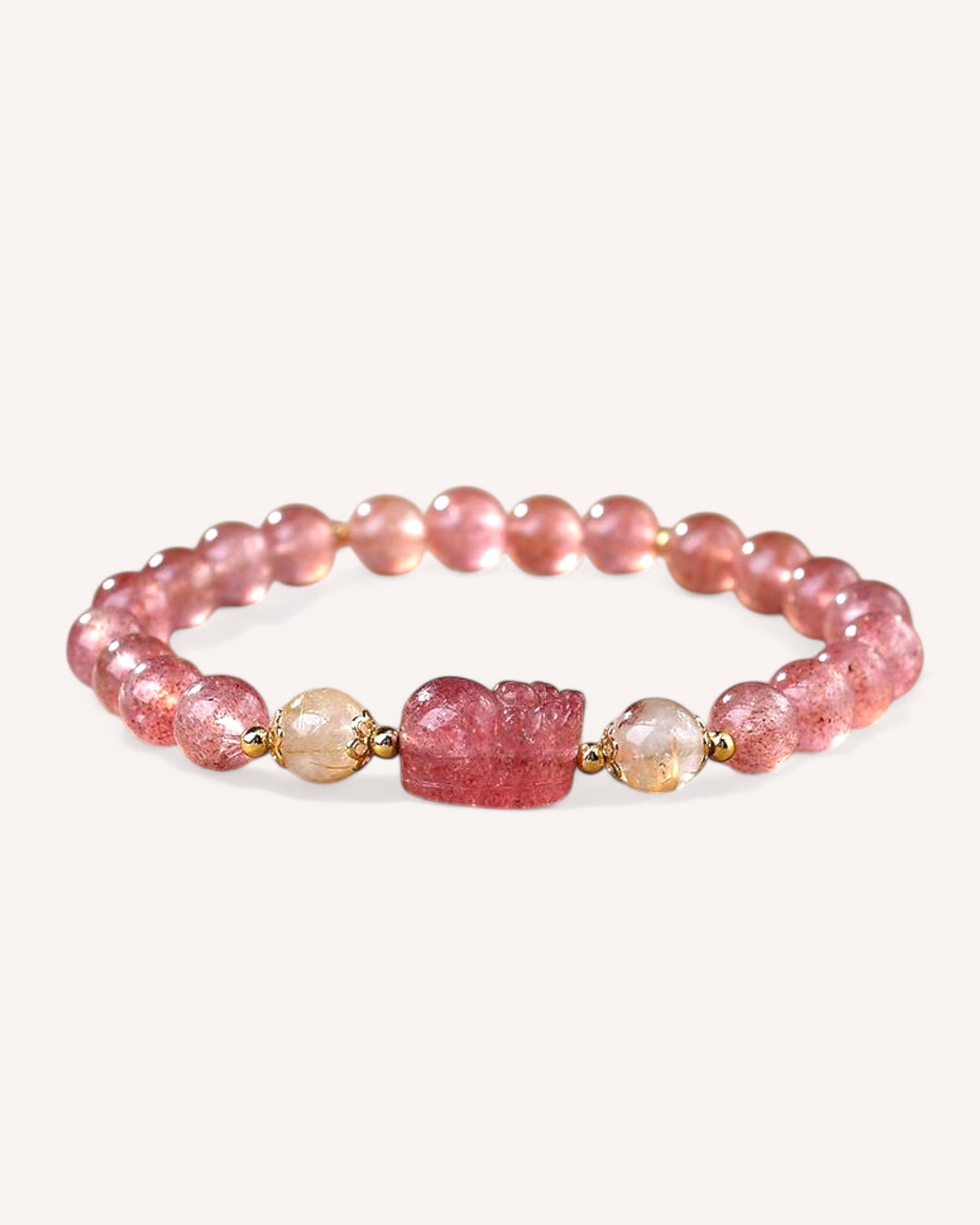 Side angle of Strawberry Quartz and Rutilated Quartz bracelet designed for emotional healing, confidence, and energy flow.