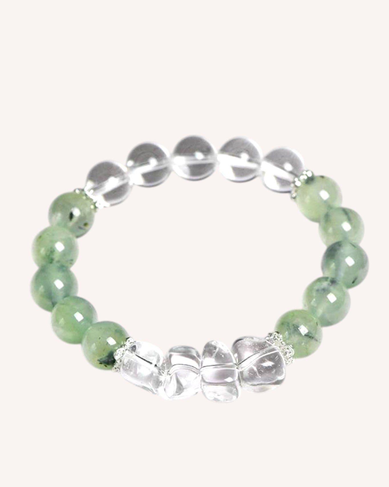 A powerful Green Prehnite & White Quartz Bracelet designed to attract prosperity, emotional balance, and spiritual clarity. Featuring silver accents for elegance and energy alignment.
