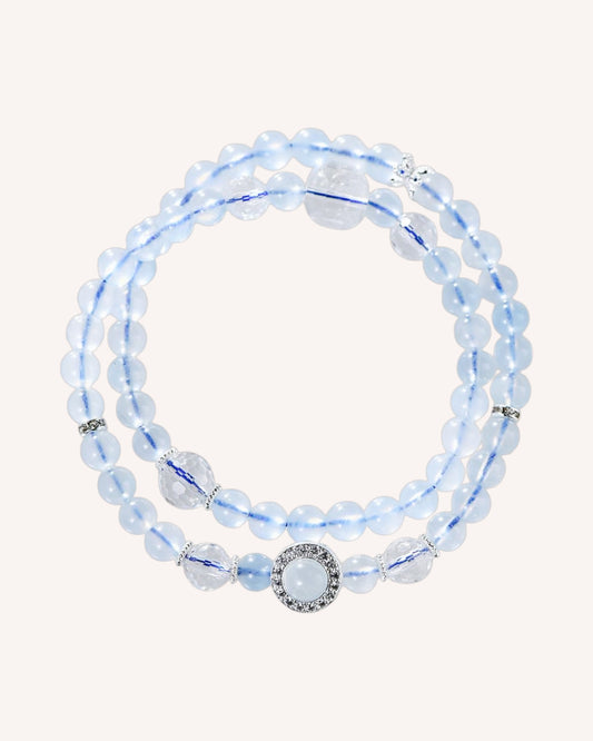 This aquamarine and white quartz wrap bracelet enhances emotional clarity, intuition, and spiritual renewal. Ideal for stress relief and inner peace.