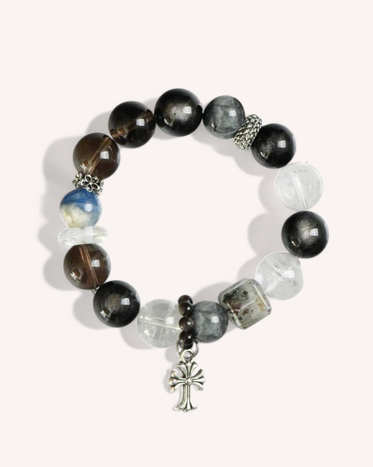 Close-up of Strength & Focus Tiger Eye Quartz Bracelet featuring Tiger Eye, Phantom Quartz, Smoky Quartz, Silver Obsidian, and Eagle Eye Stone. Designed to enhance confidence, mental clarity, and energy protection.