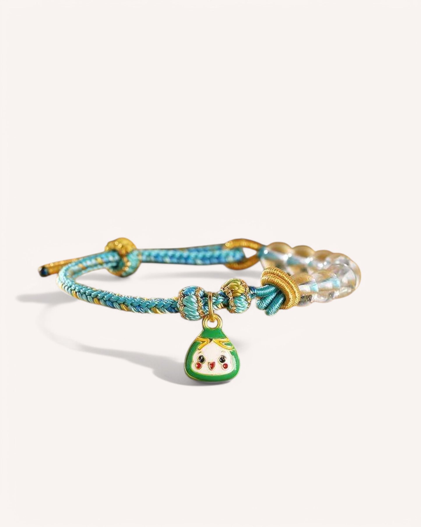 White Quartz & Blue Woven Bracelet with lucky charm, promoting prosperity, balance, and spiritual protection. Features handwoven blue cord and energy-amplifying White Quartz.