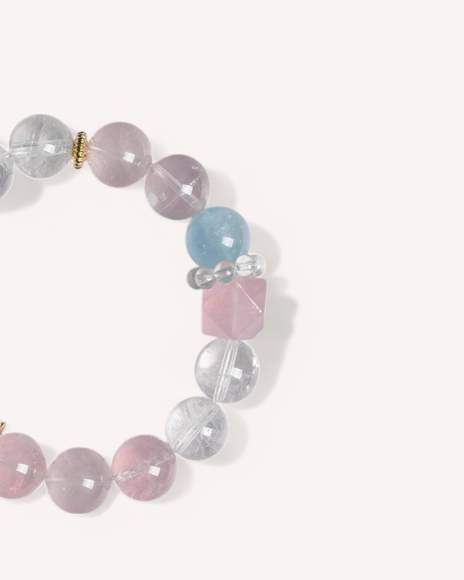 Elegant gemstone bracelet featuring Rose Quartz for love, White Quartz for clarity, and Aquamarine for calming energy. Ideal for emotional balance and personal growth.