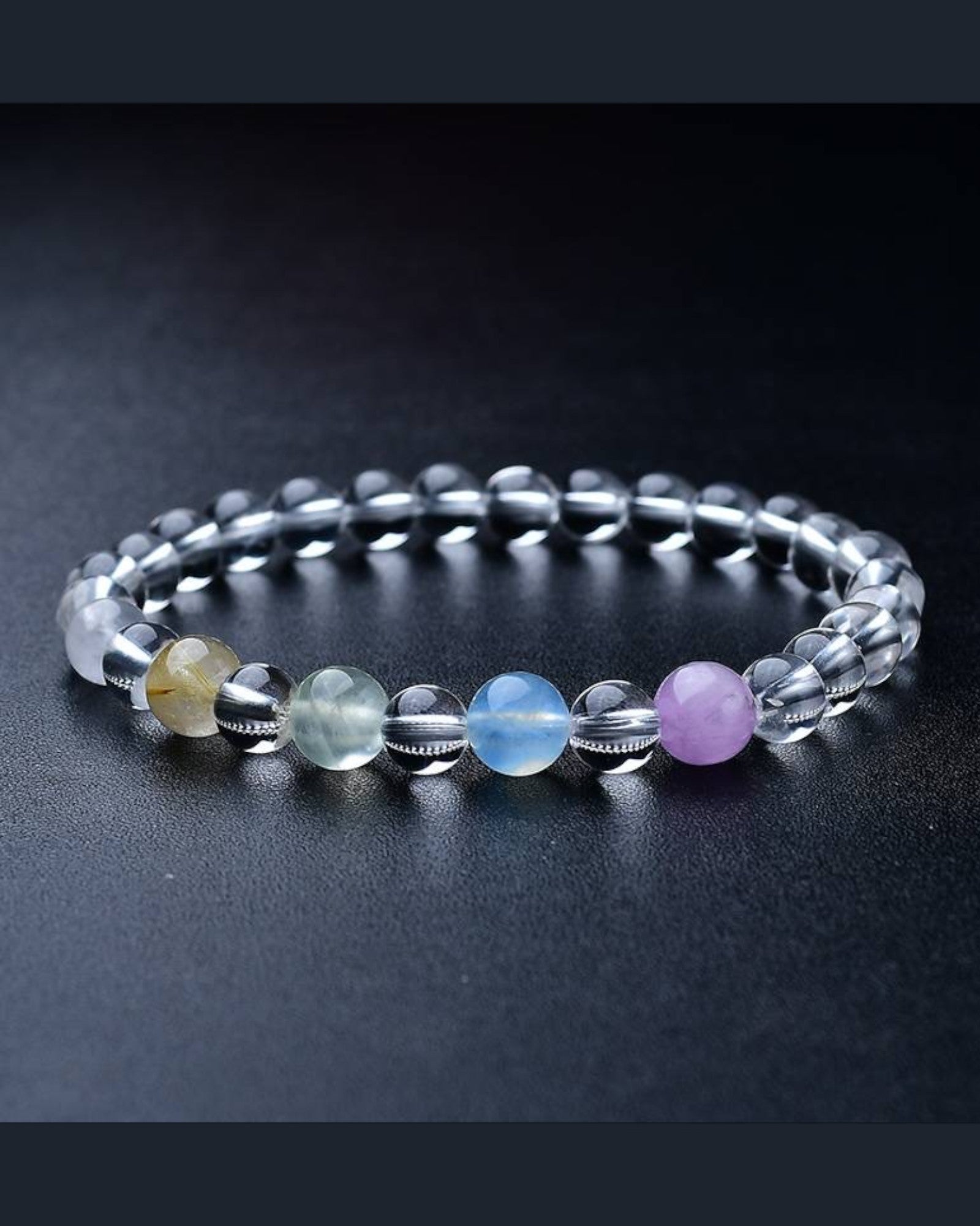 Close-up of a Spiritual Energy White Quartz Bracelet with multicolored chakra beads, enhancing intuition, emotional healing, and energy alignment.