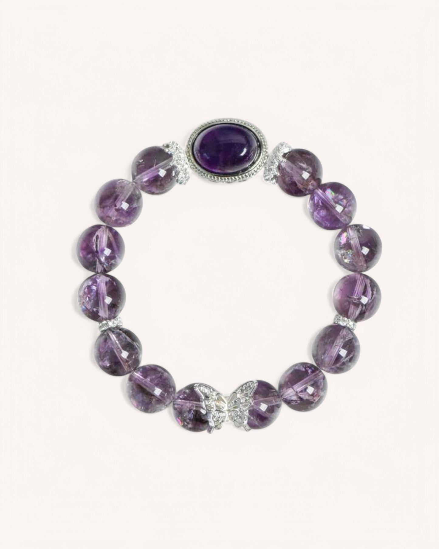 Front view of an amethyst protection bracelet featuring deep violet beads and a silver-accented oval centerpiece for spiritual balance, energy shielding, and emotional clarity.