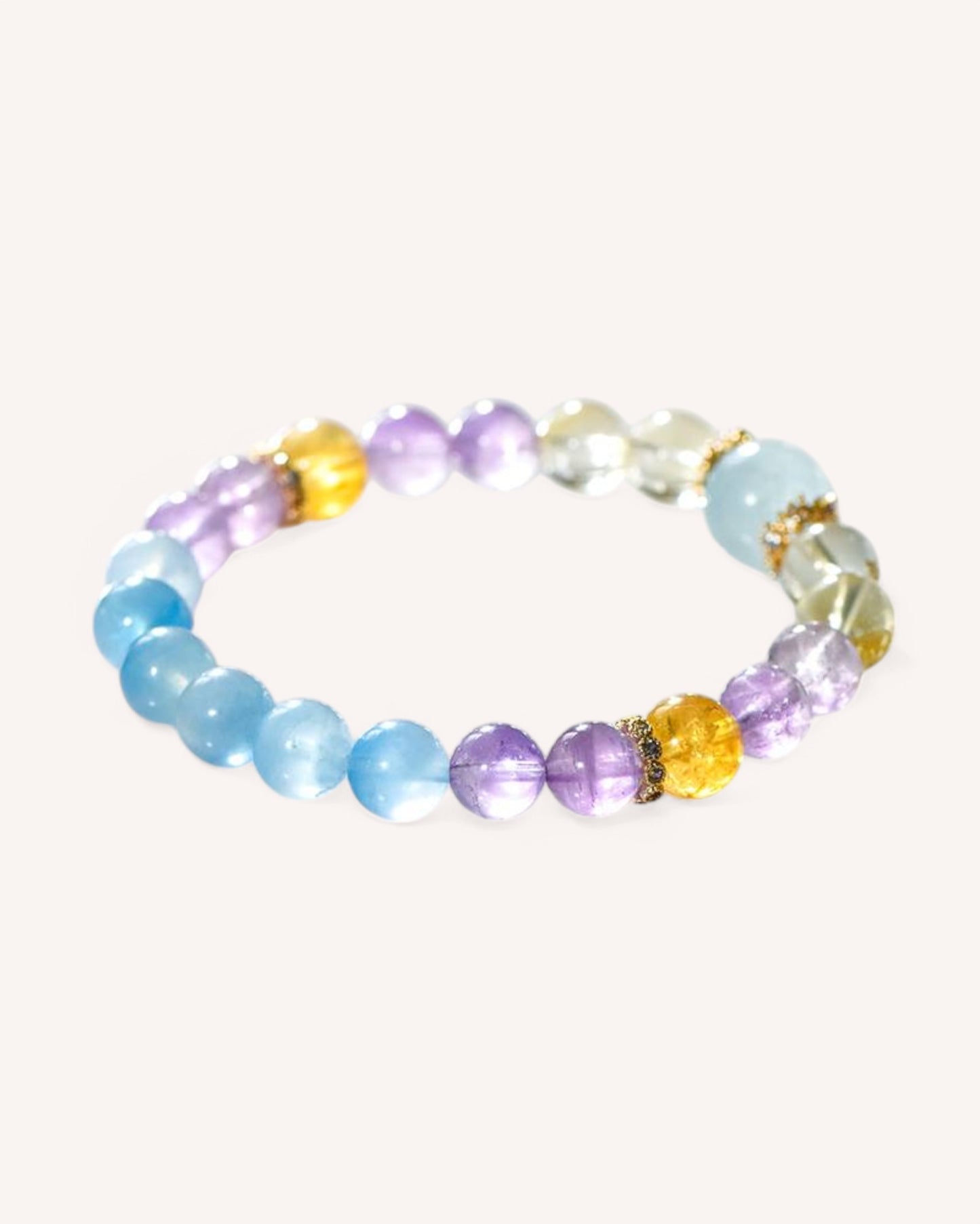 Energy bracelet featuring Aquamarine, Amethyst, and Golden Azeztulite for intuition, clarity, and emotional harmony.