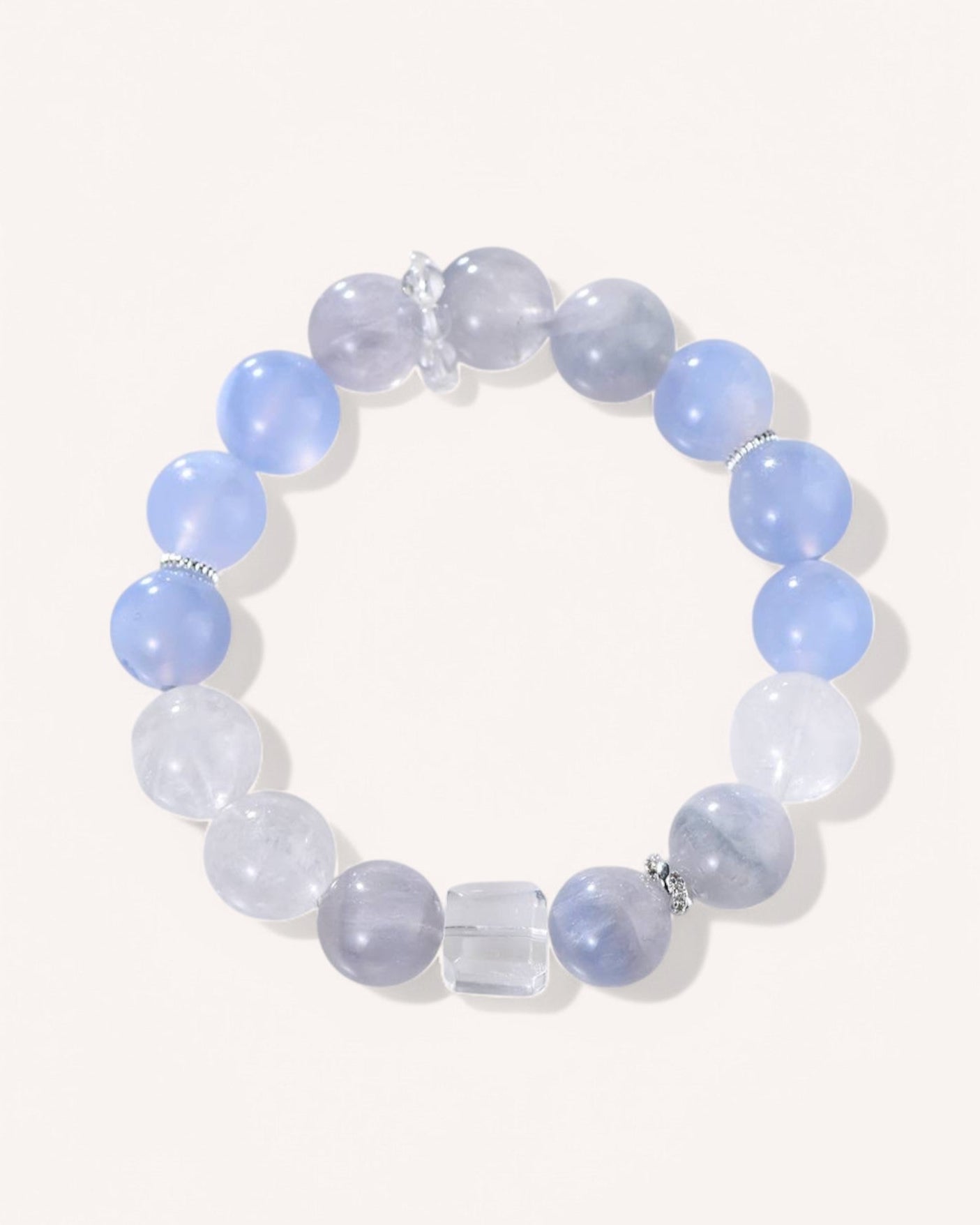 Close-up of a Blue Lace Agate & White Quartz Bracelet, featuring soft blue and white beads that promote calm, intuition, and emotional balance. Ideal for stress relief, communication, and clarity.