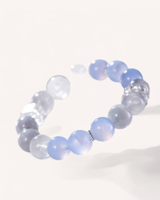 A Blue Lace Agate & White Quartz Healing Bracelet, designed for soothing emotions, enhancing intuition, and balancing energy. A perfect crystal accessory for spiritual growth and inner wisdom.