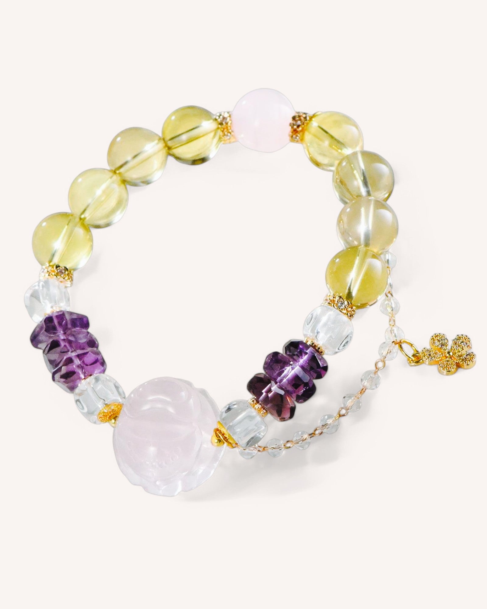 Citrine, Rose Quartz, and Amethyst Bracelet with Fox Charm – A spiritual energy bracelet designed to enhance love, attraction, and prosperity.