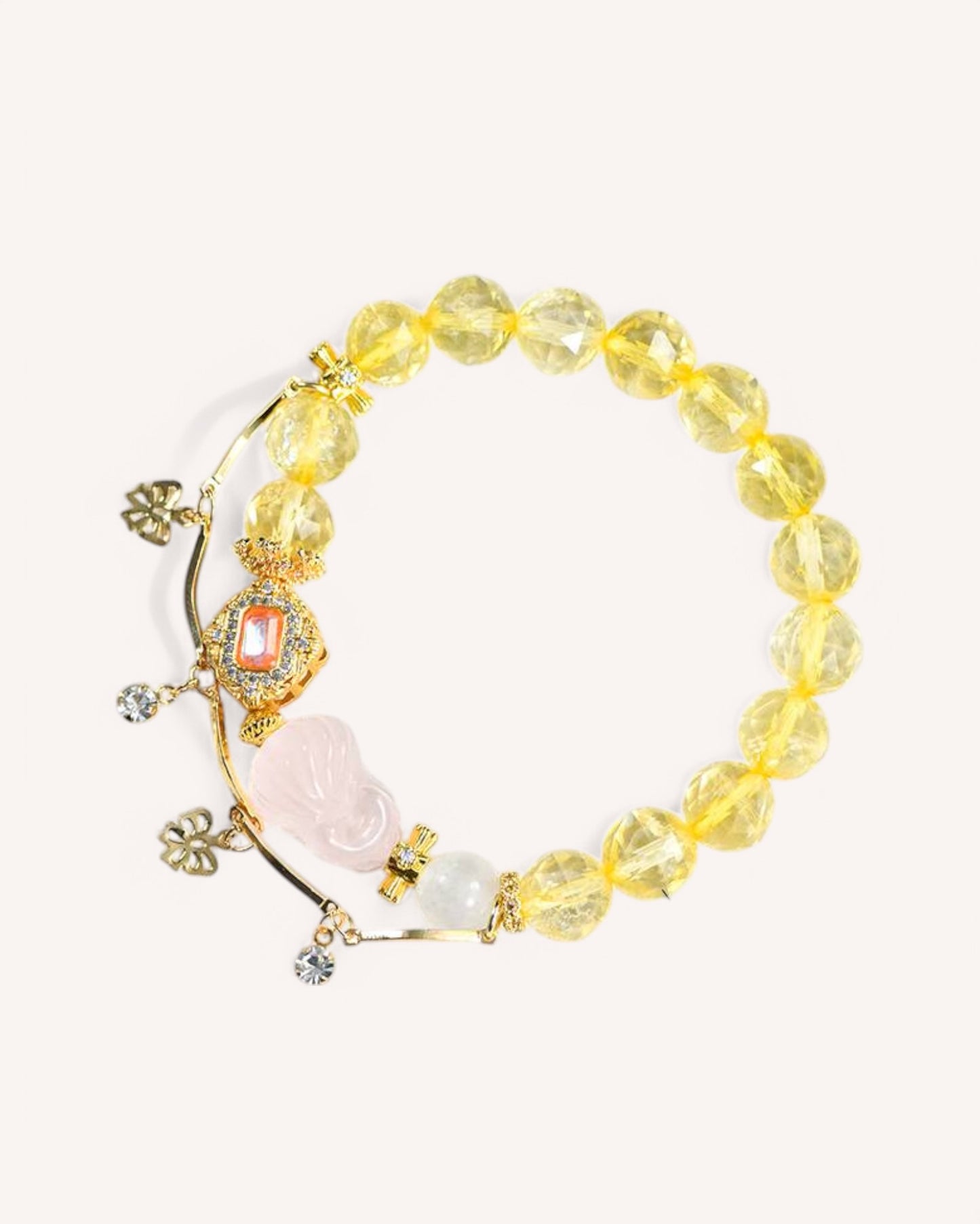 Citrine & Rose Quartz Romantic Bracelet – A handcrafted bracelet designed for love, confidence, and prosperity. Features a Nine-Tailed Fox charm, amplifying attraction, charm, and emotional harmony.
