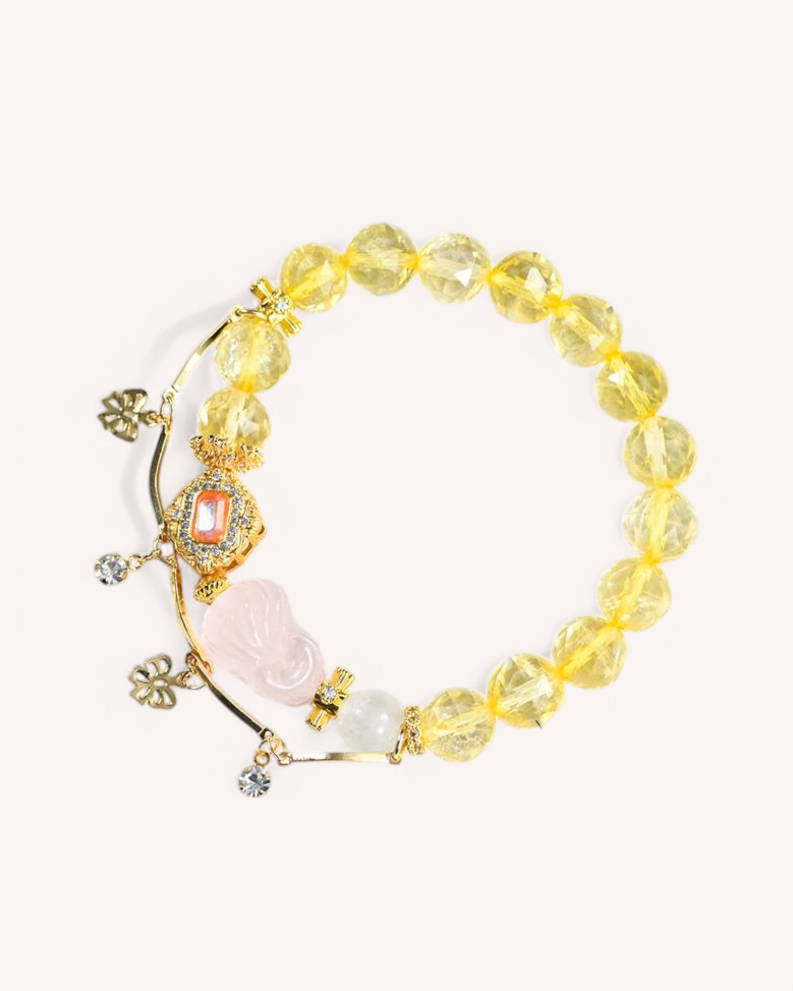 Citrine & Rose Quartz Romantic Bracelet – A handcrafted bracelet designed for love, confidence, and prosperity. Features a Nine-Tailed Fox charm, amplifying attraction, charm, and emotional harmony.