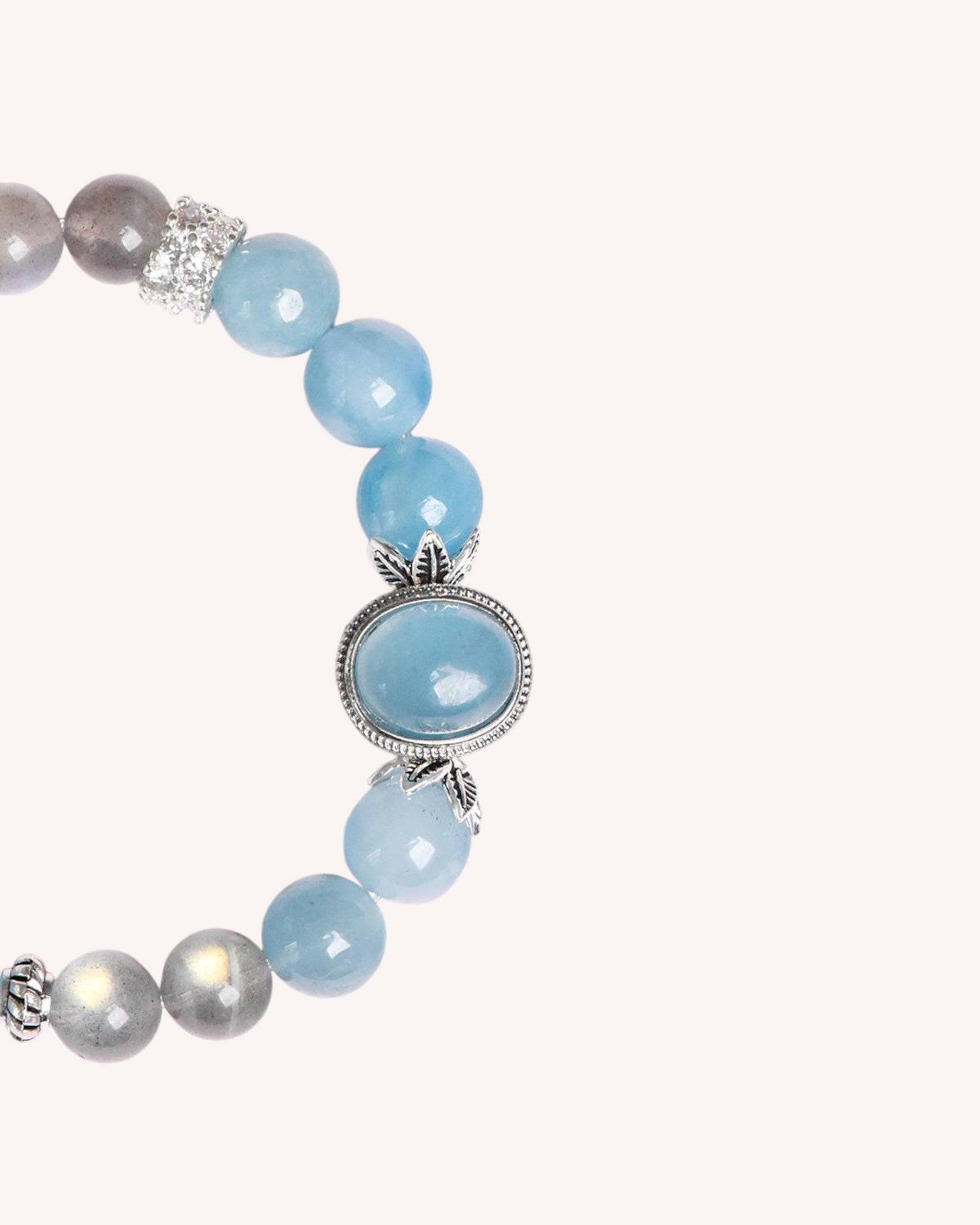 Elegant healing bracelet featuring Aquamarine and Gray Moonstone to promote emotional balance and self-reflection