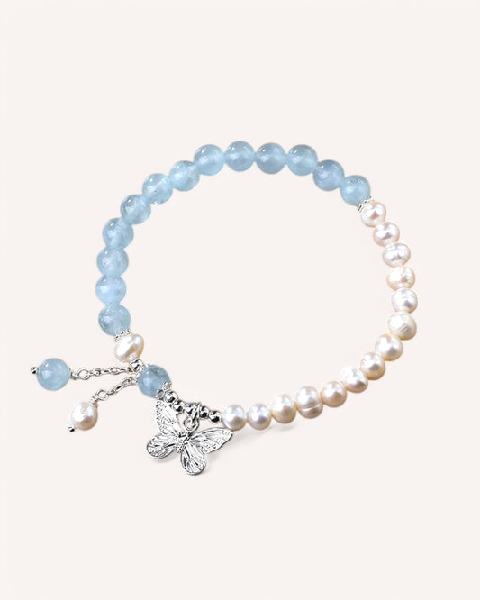 Elegant Aquamarine and Pearl bracelet with butterfly charm for emotional healing and clarity