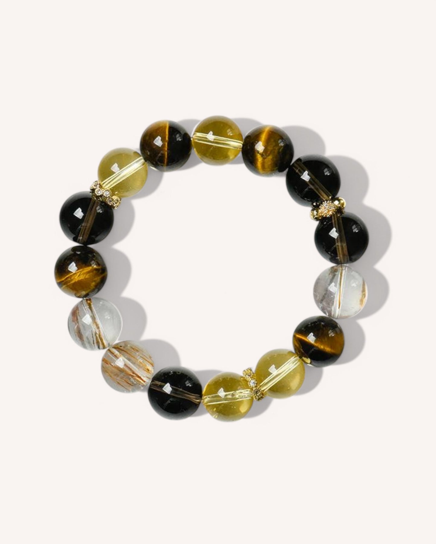 Golden Tiger Eye, Citrine & Smoky Quartz Bracelet with Black Gold Obsidian – A handcrafted natural crystal bracelet designed for confidence, prosperity, and protection. Features high-quality golden tiger eye for courage, citrine for abundance, smoky quartz for grounding, and black gold obsidian for shielding negative energy.
