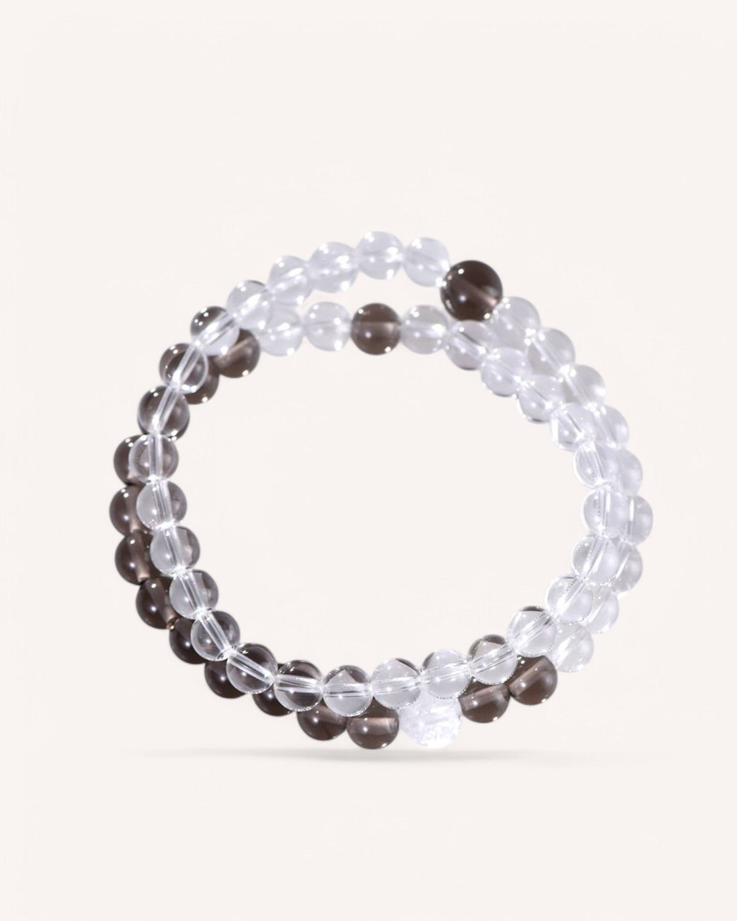 Smoky Quartz & White Quartz Bracelet for grounding, stability, and mental clarity. This double-layered crystal bracelet enhances focus and relieves stress.