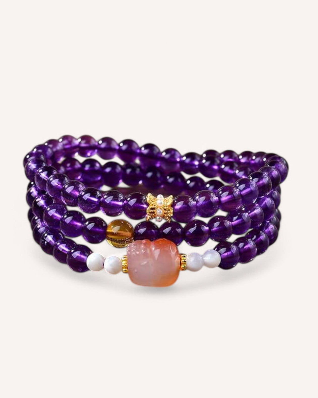 Multi-layer Amethyst bracelet with Sunstone, designed for energy balance, emotional healing, and personal empowerment. A perfect piece for meditation and daily wear
