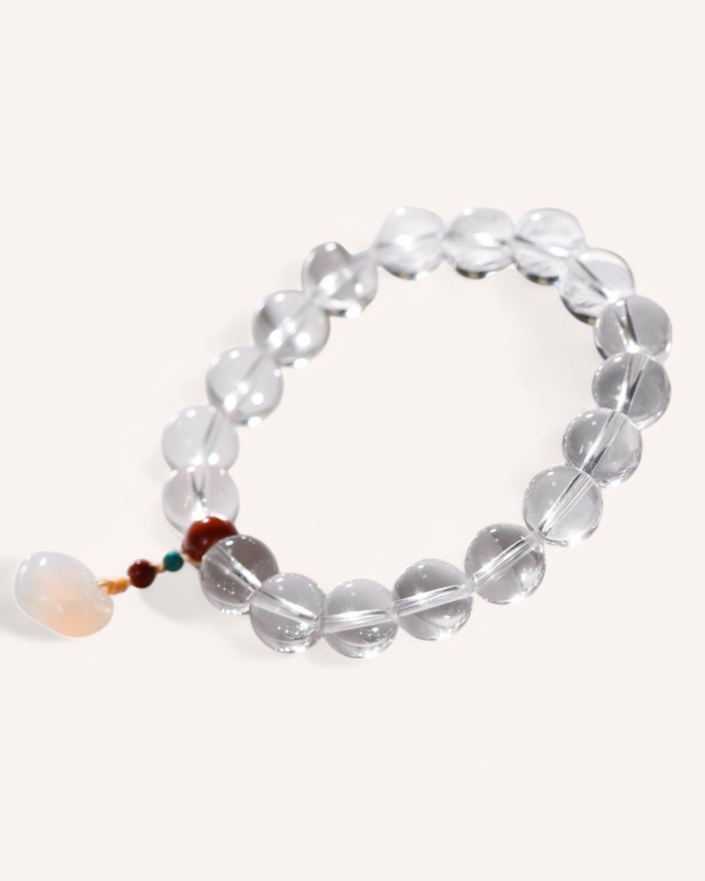 Healing Energy White Quartz Bracelet – Strengthens grounding, protection, and emotional balance with Red Agate and Turquoise.