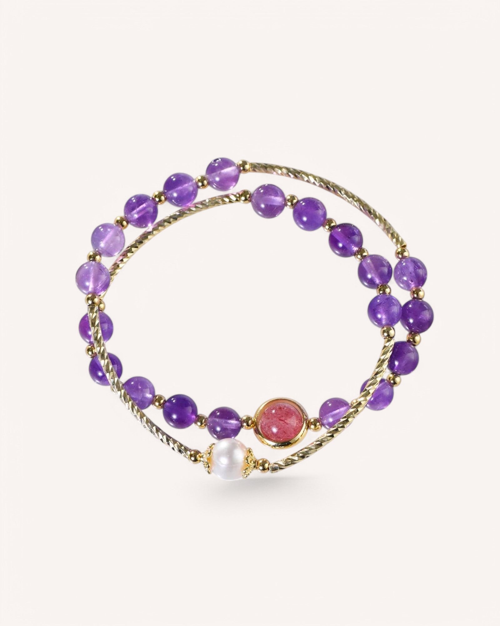 Close-up of Amethyst and Strawberry Quartz bracelet with dual-layer wrap design, symbolizing love, harmony, and spiritual balance. A perfect energy healing accessory.