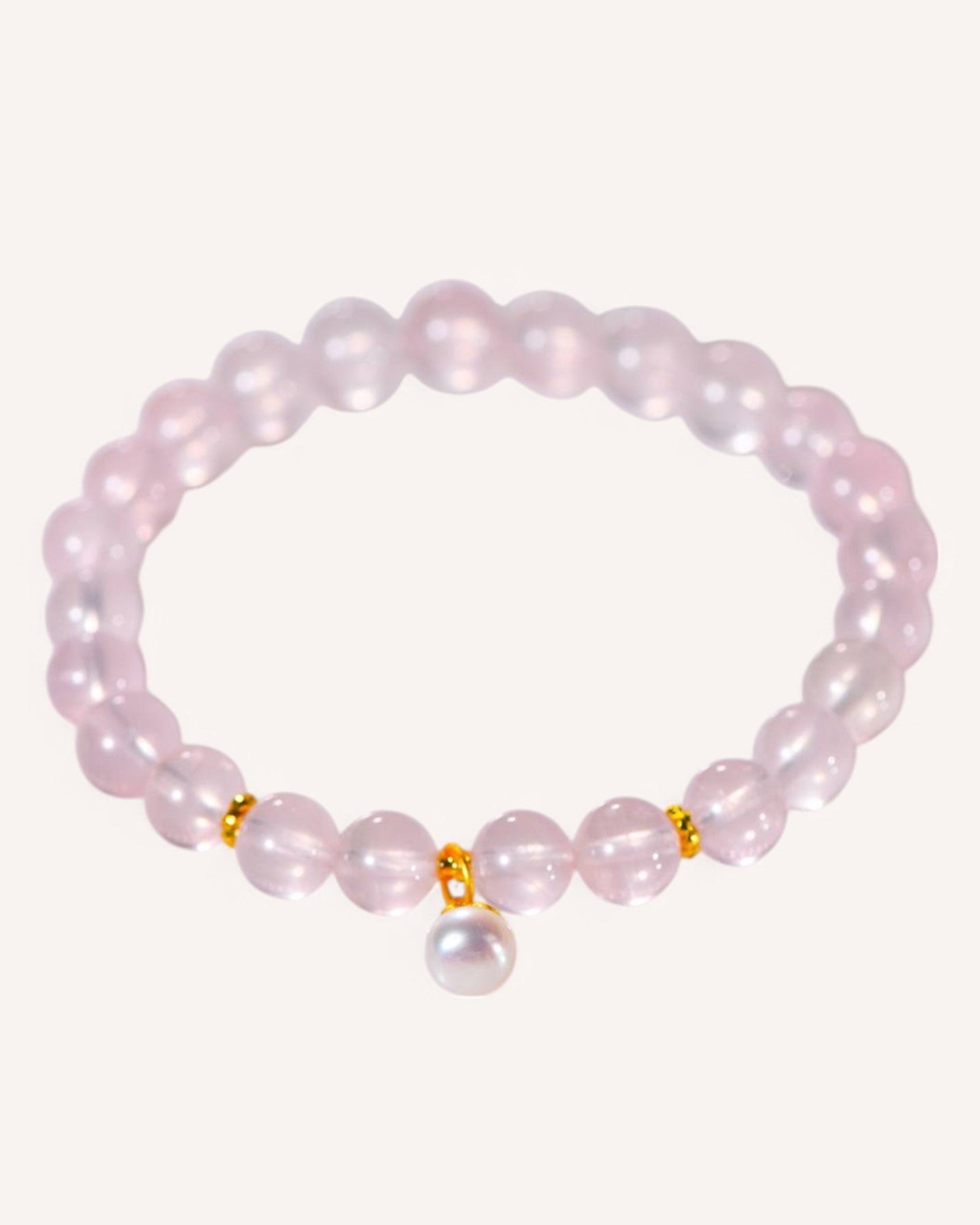 Rose Quartz and Pearl Bracelet for emotional healing and love, featuring gold and silver accents