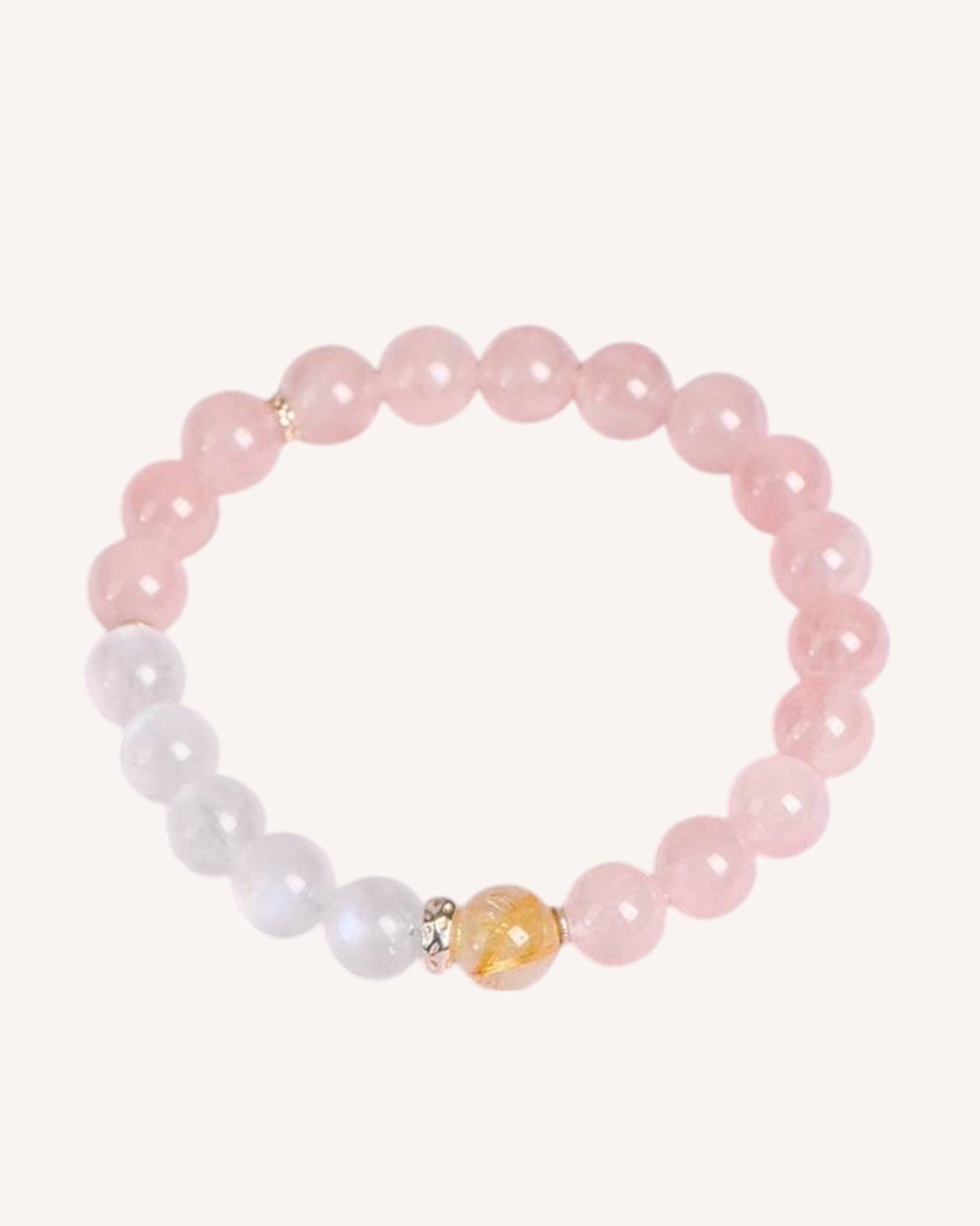 Side angle of the Love & Intuition Rose Quartz & Blue Moonstone Bracelet, showcasing its elegant design and crystal healing energy.