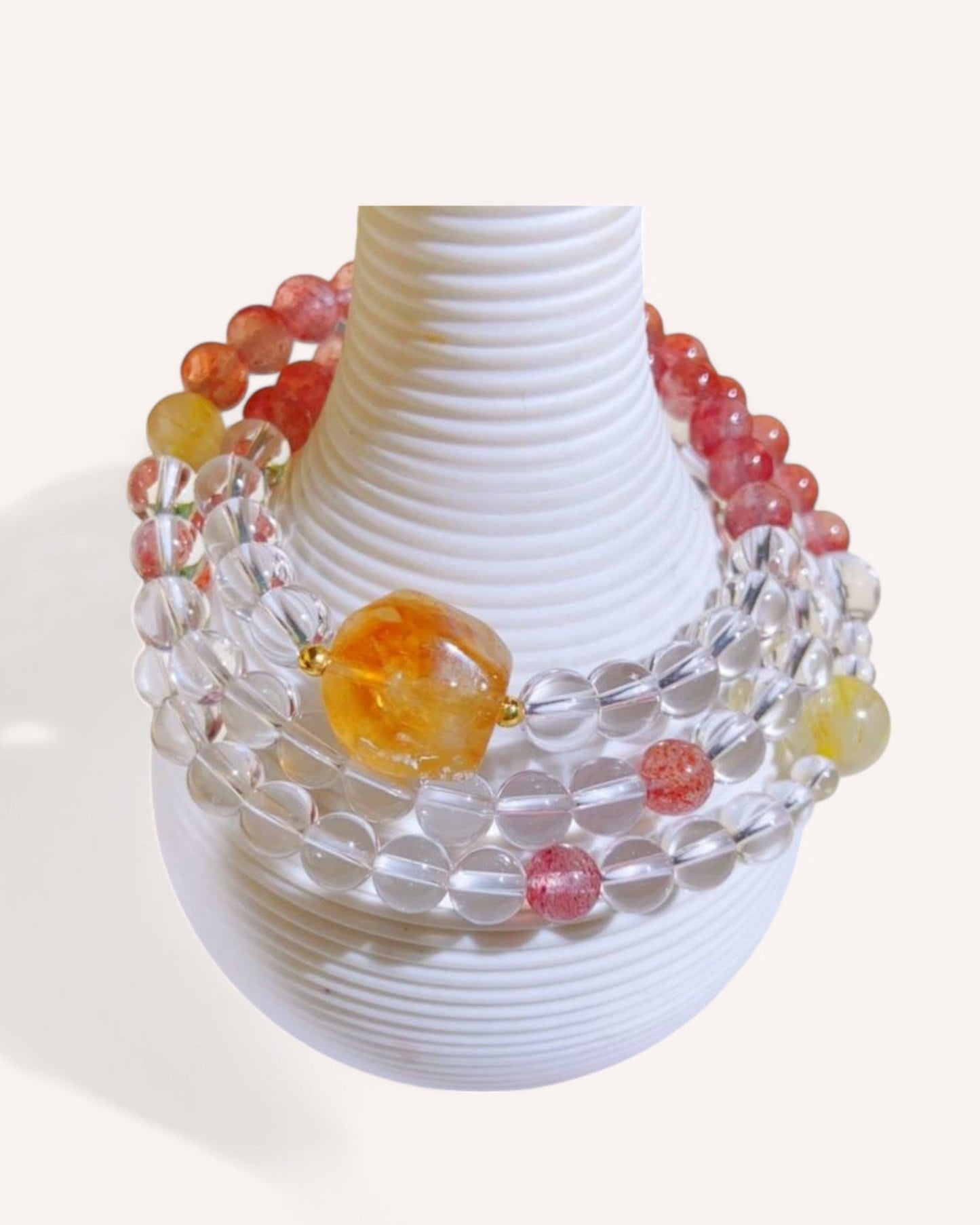 Multi-layered Pink Quartz, Citrine & White Quartz Bracelet, promoting love, success, and positivity with an elegant and vibrant design.