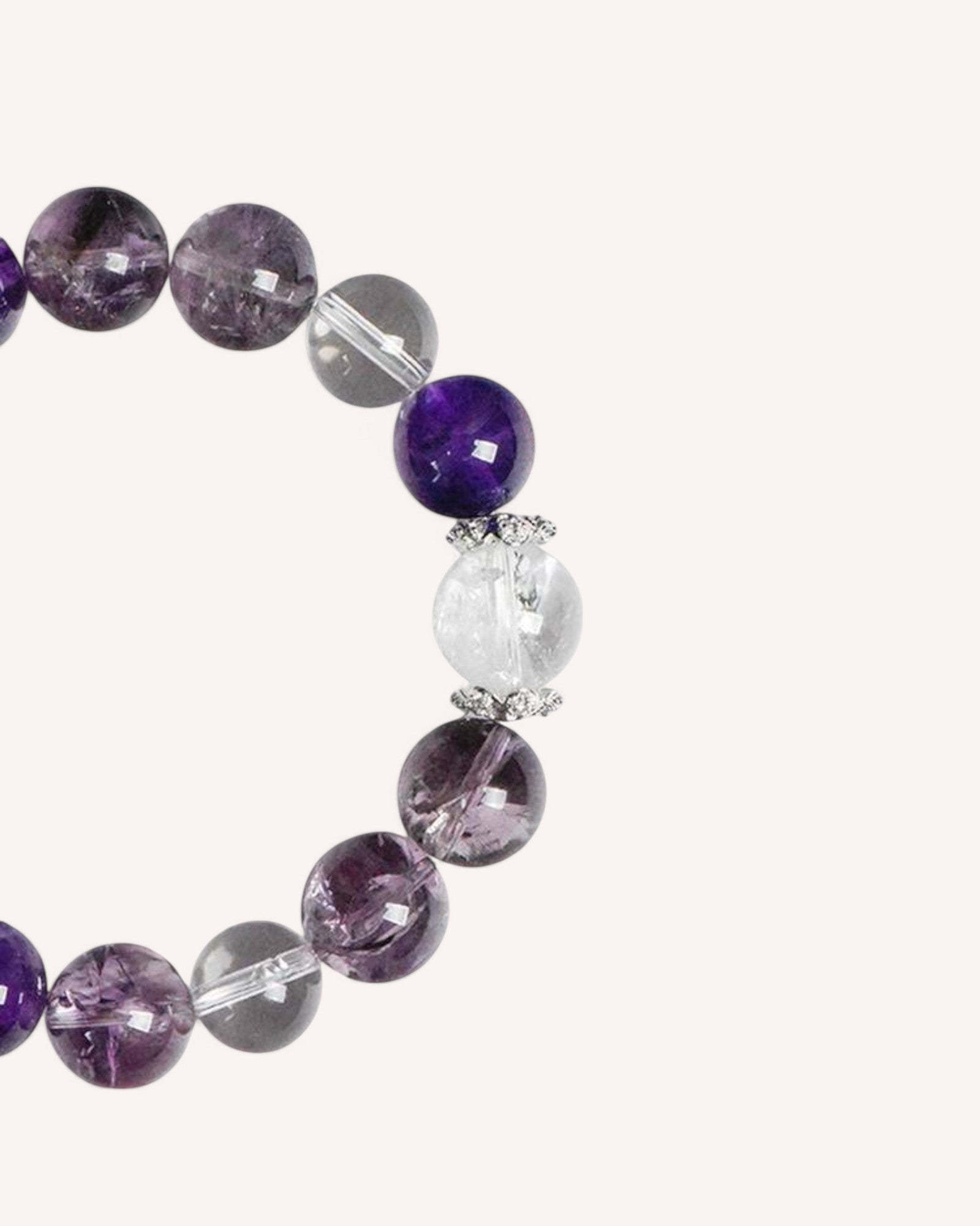 Amethyst and White Quartz bracelet designed for meditation, energy alignment, and grounding, with cube-cut beads enhancing structure and stability.