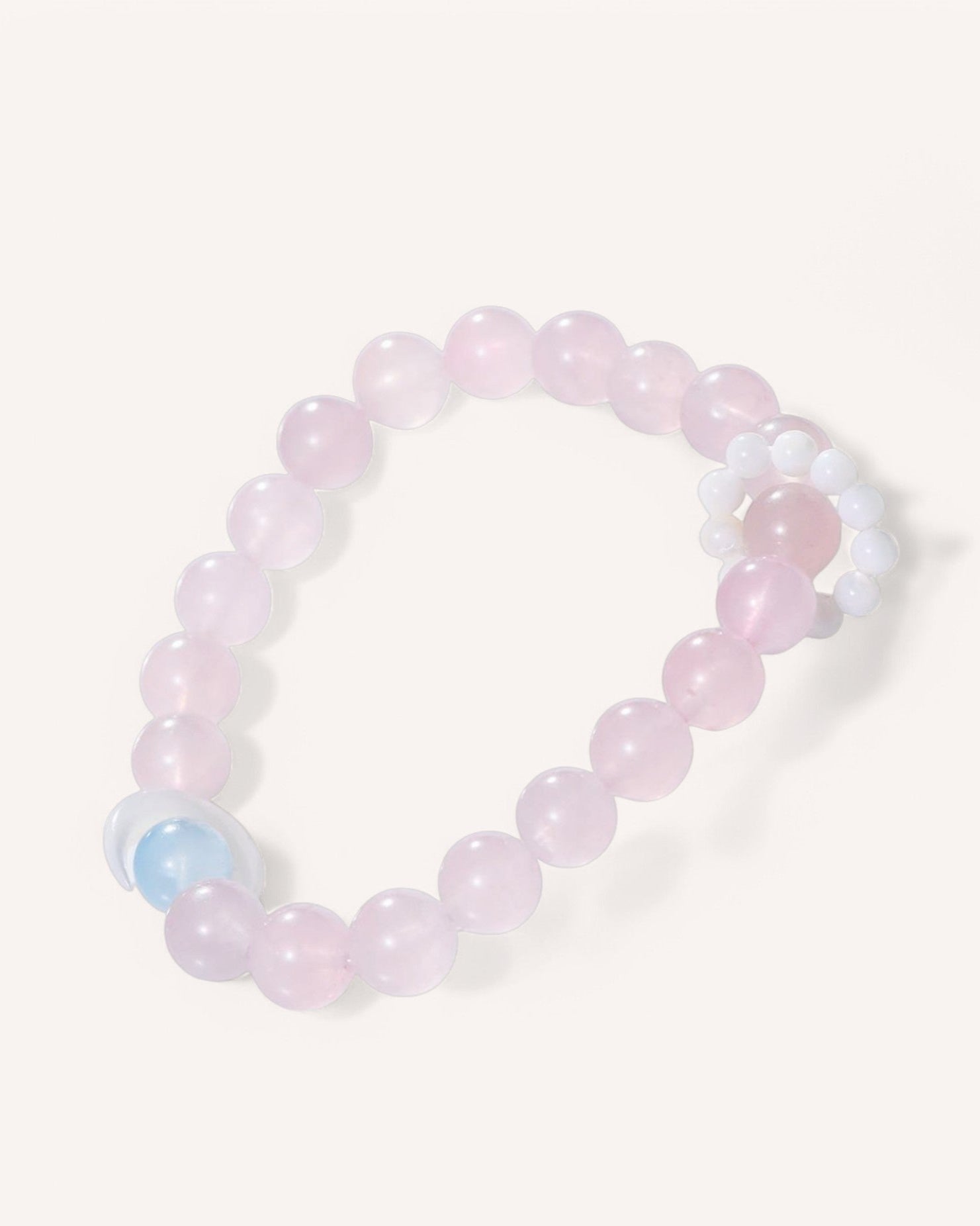 Front view of Morganite and Aquamarine bracelet with white mother of pearl, designed for emotional healing and inner peace.