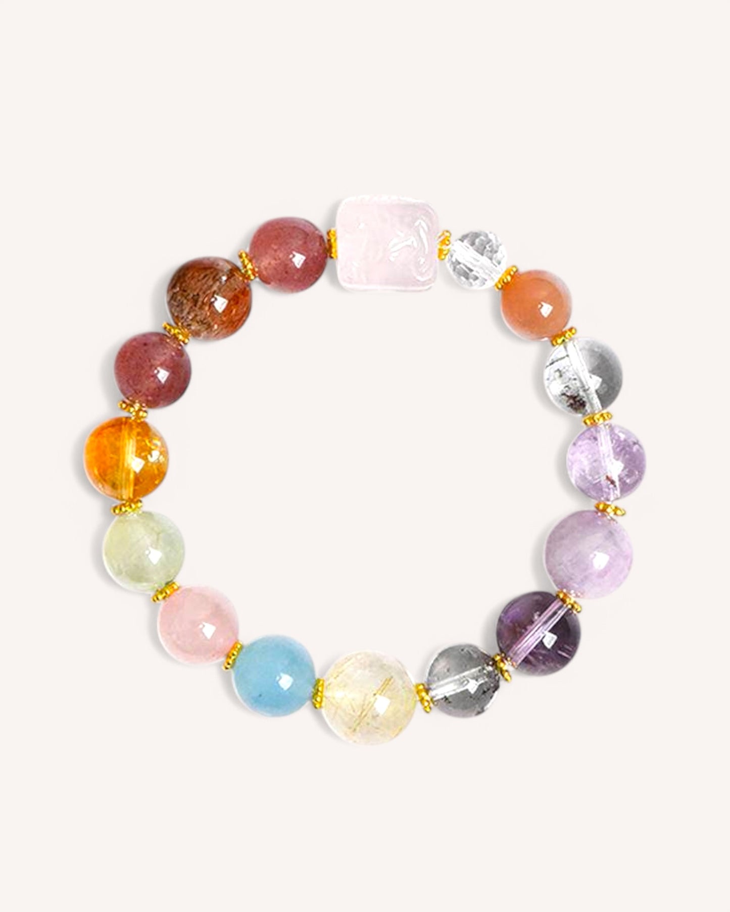 Multi-gemstone crystal bracelet with Rose Quartz, Amethyst, Citrine, and Aquamarine for emotional healing and feminine energy