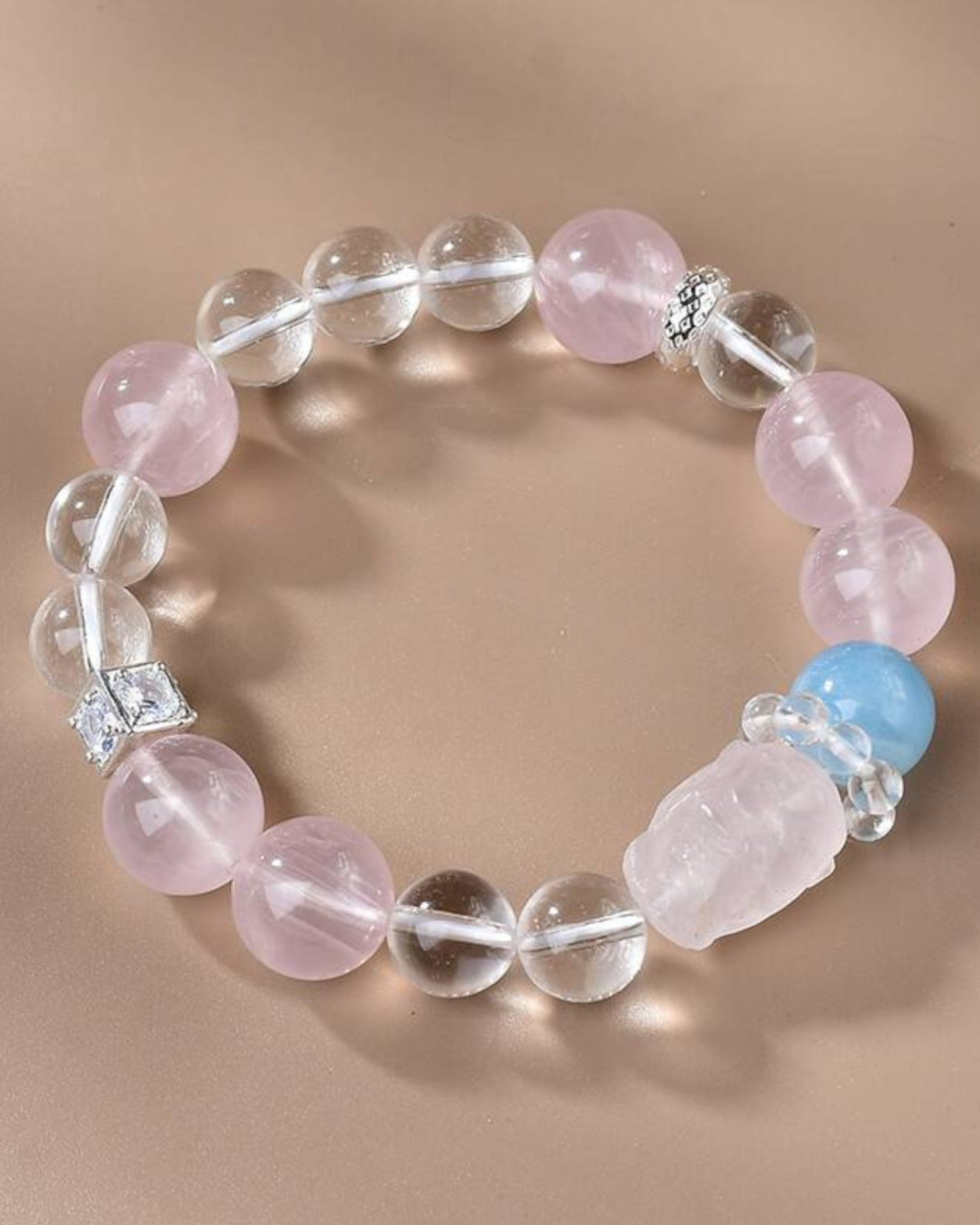 Rose Quartz Aquamarine and White Quartz bracelet for love, emotional healing, and spiritual clarity on neutral background