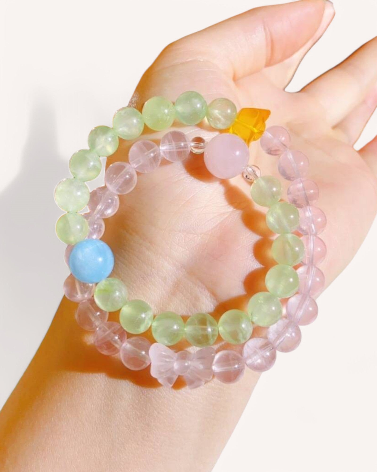 Double-layer healing bracelet featuring rose quartz, natural beeswax, and aquamarine, designed for emotional balance, positivity, and self-love.