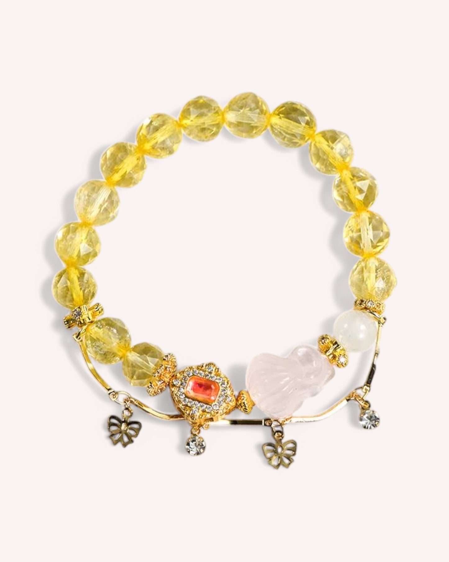Rose Quartz Nine-Tailed Fox Love Bracelet – Showcased elegantly, this crystal bracelet blends Citrine’s wealth-attracting energy with the Nine-Tailed Fox Rose Quartz charm, known for enhancing romance, charm, and relationship stability.