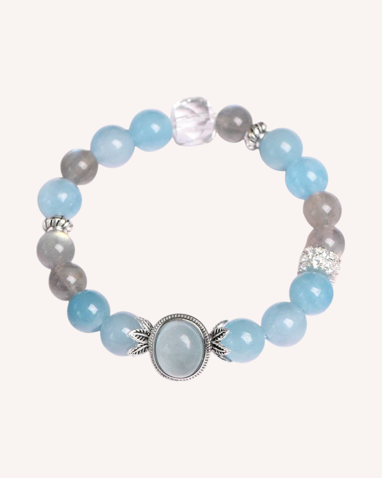 Side view of crystal bracelet made with Aquamarine, Gray Moonstone, and White Quartz for spiritual awareness
