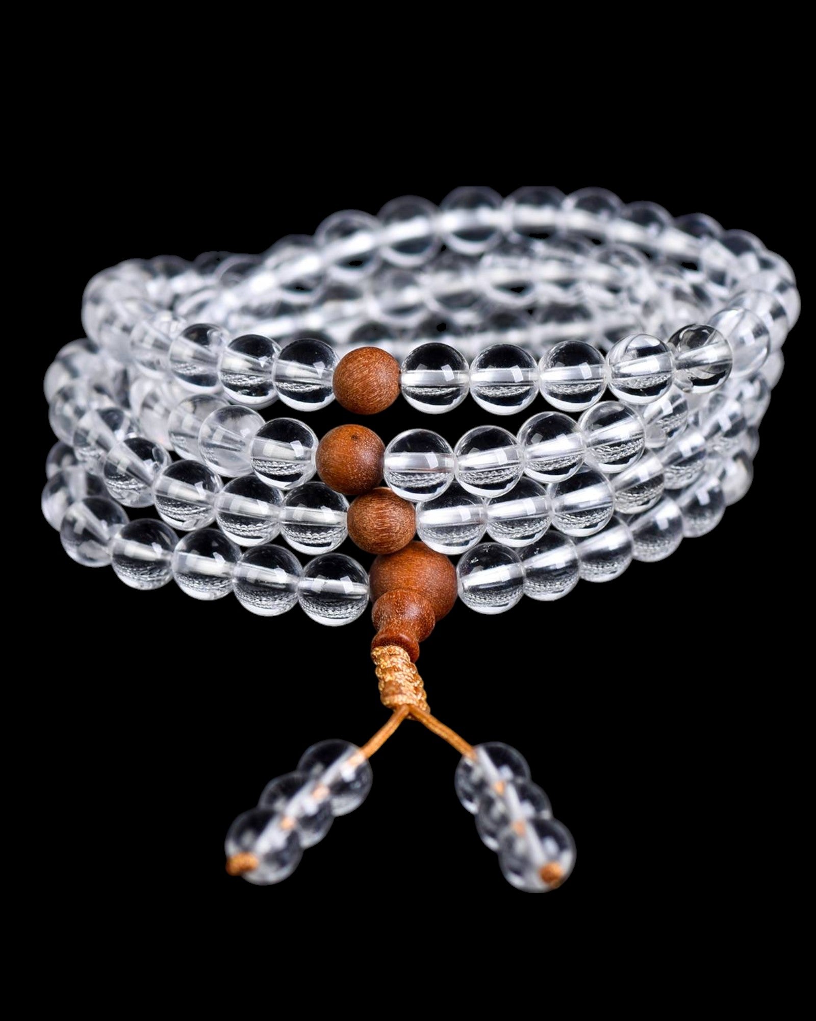 Handcrafted White Quartz Mala Bracelet with Sandalwood beads, promoting relaxation, emotional balance, and spiritual enlightenment.