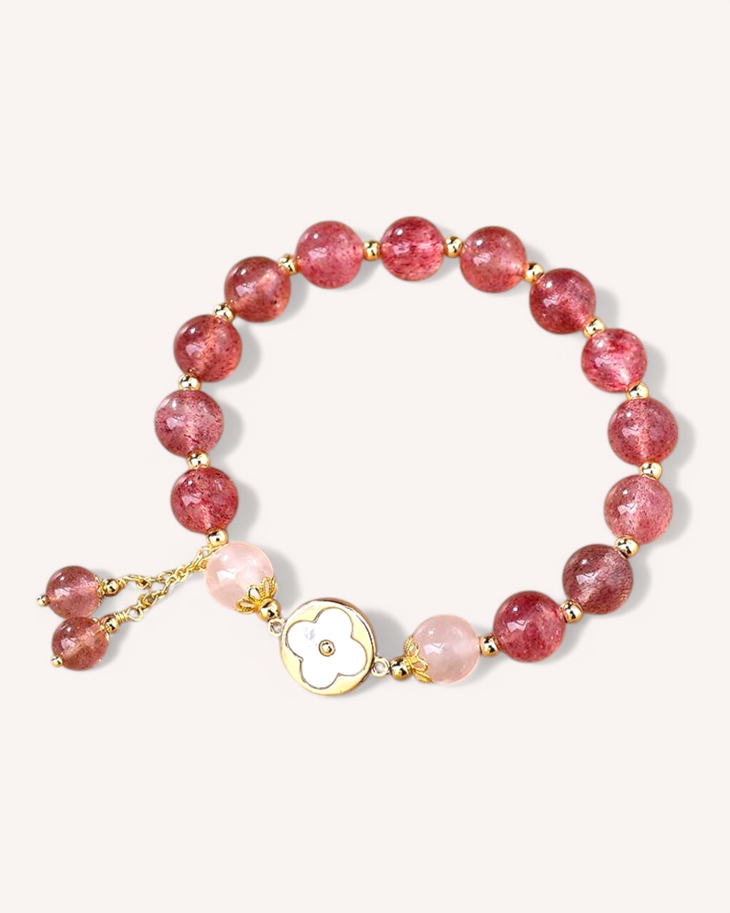 Front view of Strawberry Quartz Bracelet for love, emotional healing, and positivity with floral charm