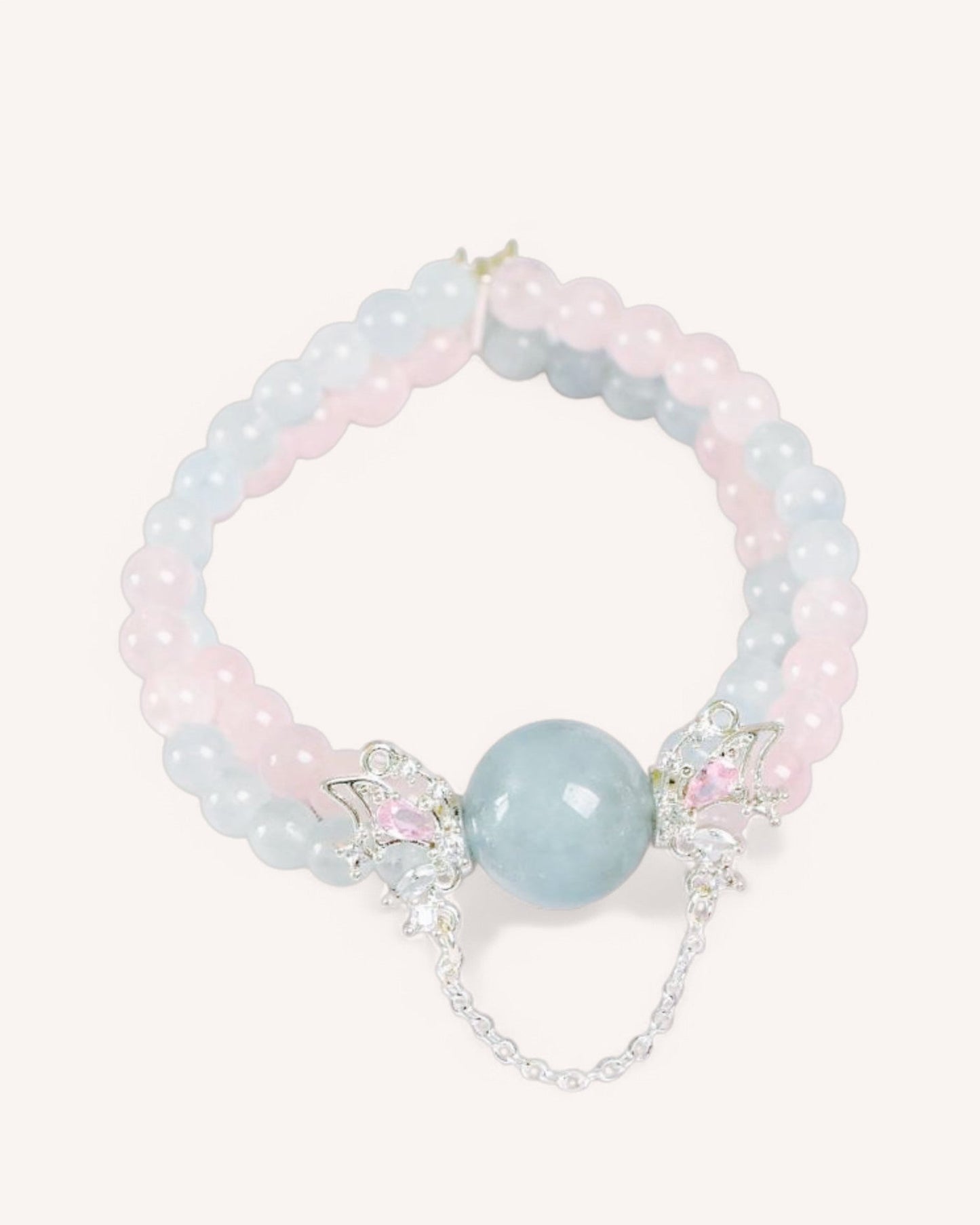 Side view of the Transformative Butterfly Bracelet with Aquamarine & Rose Quartz, designed for emotional healing, love, and inner peace.