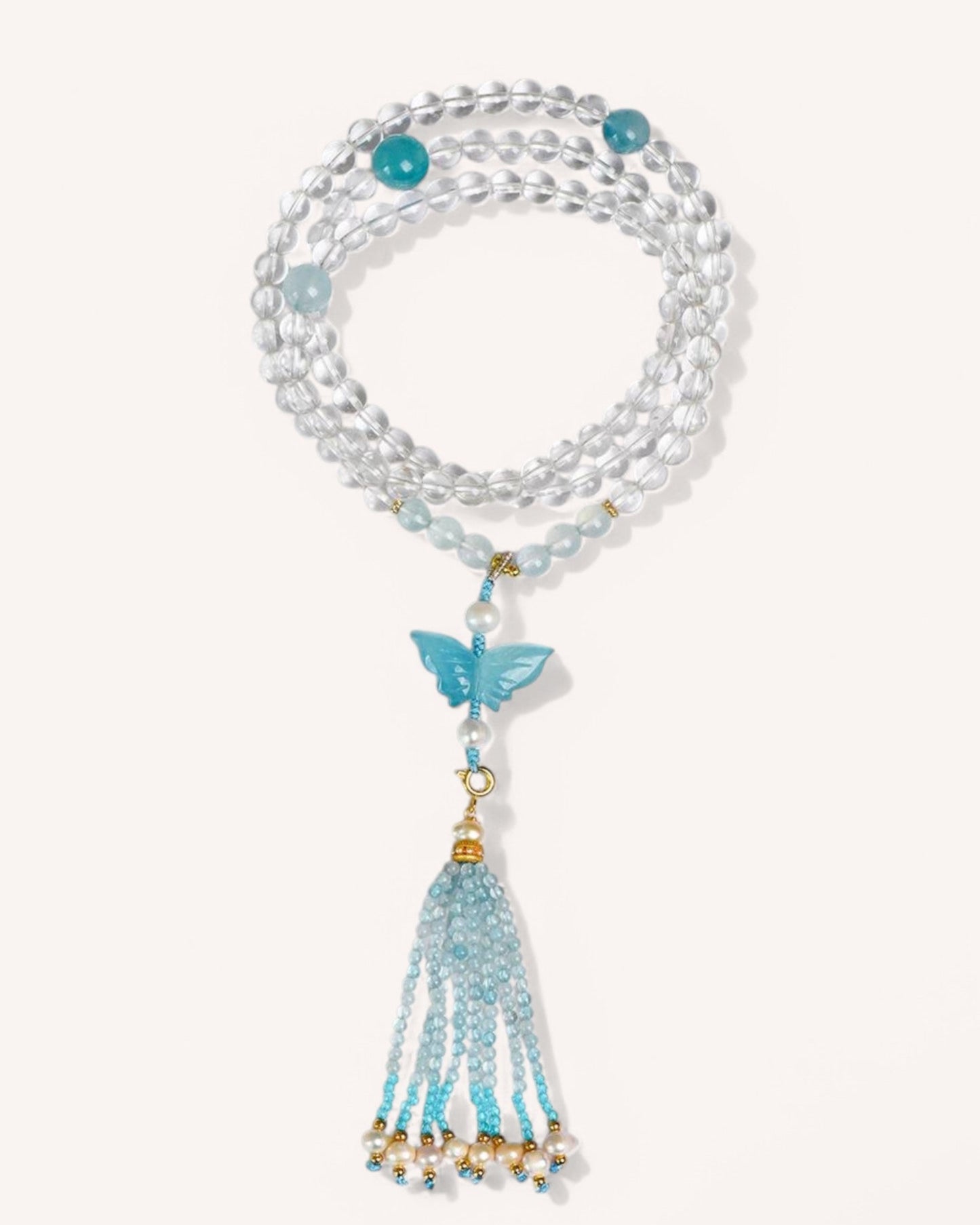 White Quartz & Aquamarine Butterfly Bracelet featuring layered design with natural pearls, promoting emotional balance, clarity, and spiritual renewal.