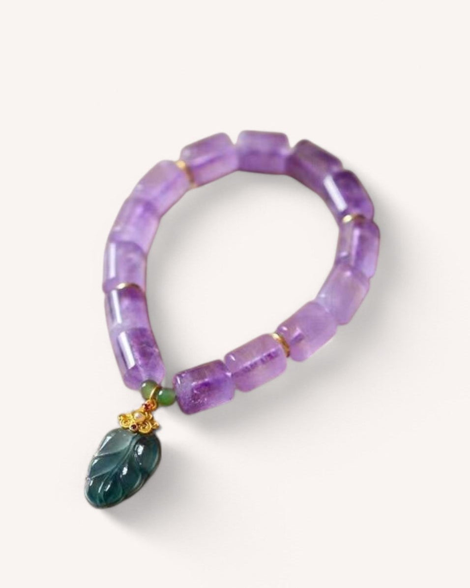 Elegant Lavender Amethyst Bracelet with jade pendant. A spiritual energy piece for inner wisdom, emotional balance, and tranquility.